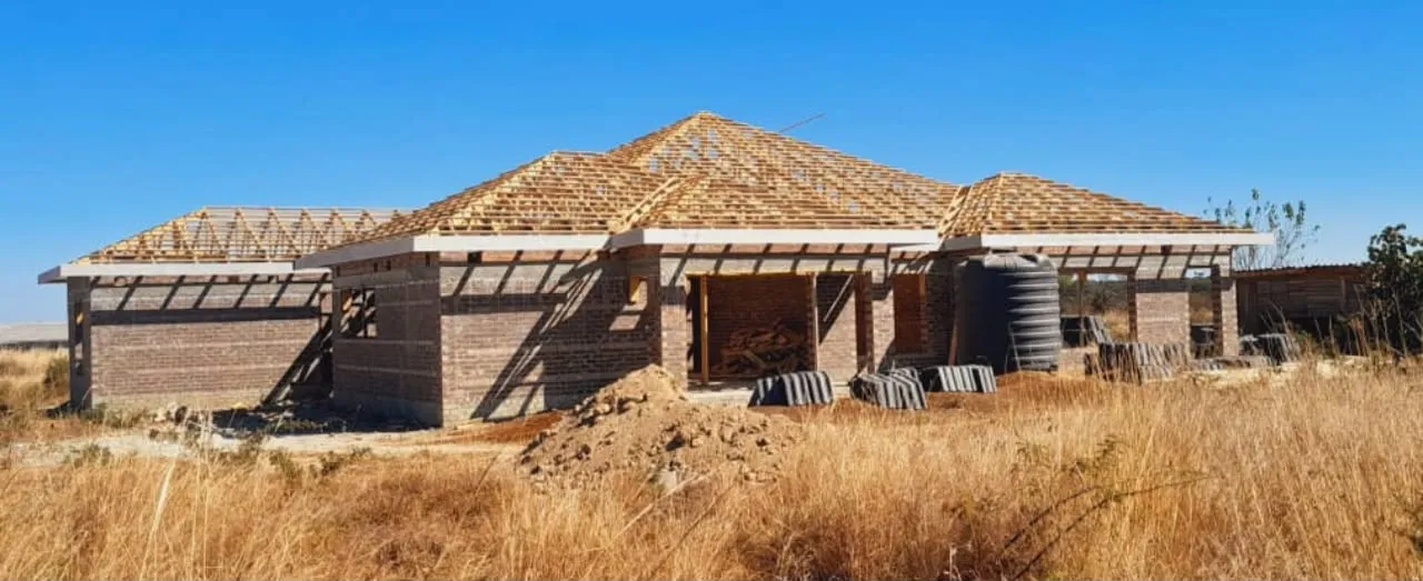 Residential brick structure with extensive timber roof framing